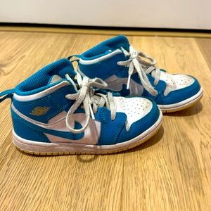 Teal and white kids air Jordan’s